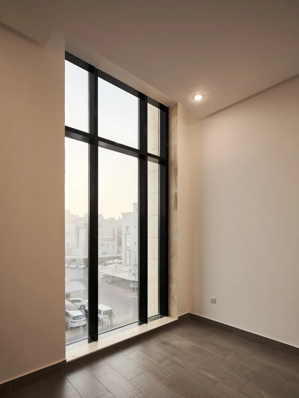 Finished room with tall window