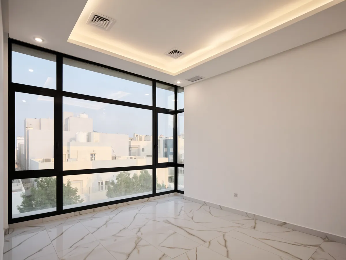 Finished living space with marble flooring