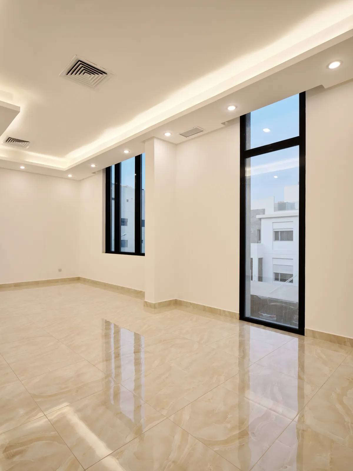Finished room with polished stone flooring